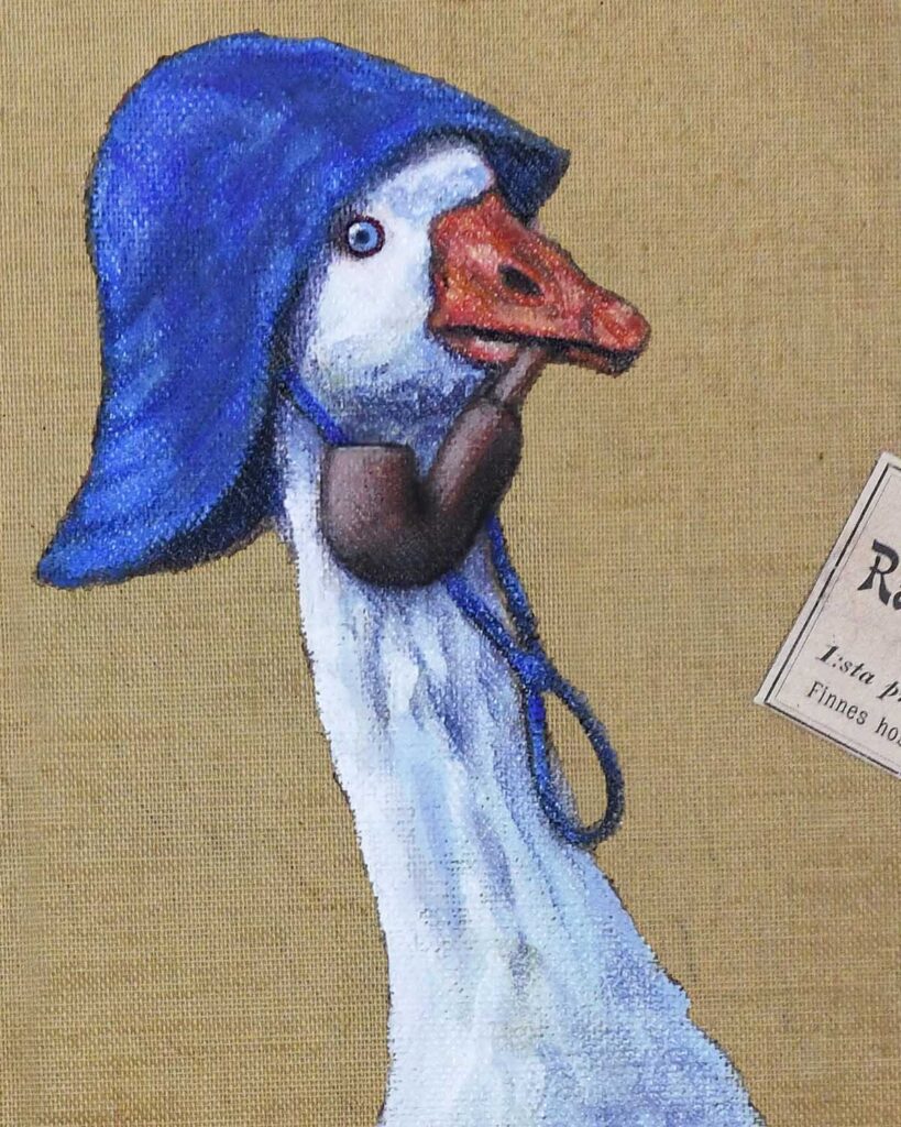 close up of Goose in blue rainhat by  Jenny Holmlund